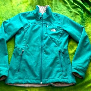 The North Face soft teal shell jacket, size small in women’s